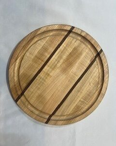 Maple cutting board with Walnut accent stripes.